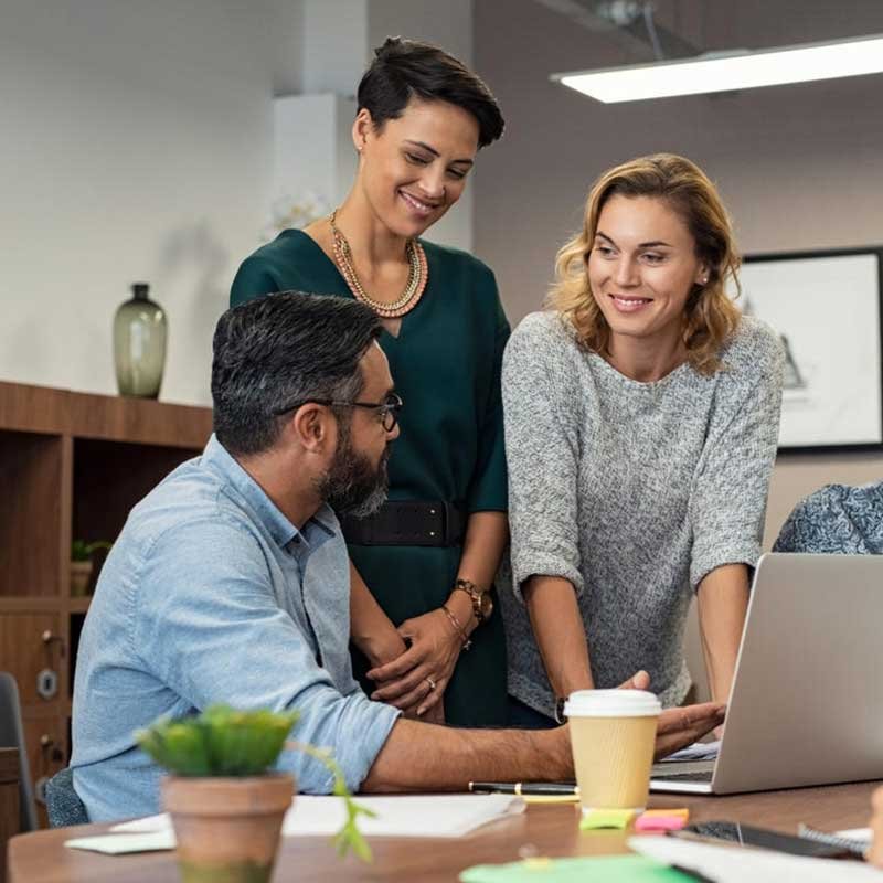 Professionals collaborating around a table